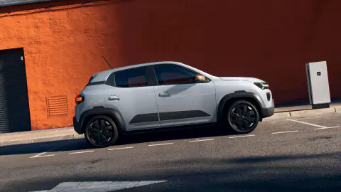 Dacia Spring Extreme Bianco Kaolin, vista laterale